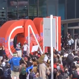 Protesters Are Throwing Glass Bottles at Entrance to CNN Center in Atlanta