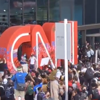 Protesters Are Throwing Glass Bottles at Entrance to CNN Center in Atlanta