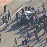 Protestors block 101 Freeway, smash patrol car window in downtown L.A. during protest over George Floyd’s death