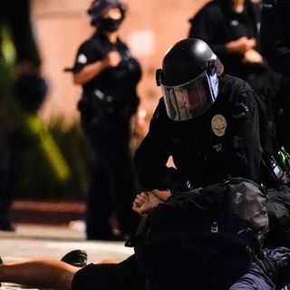 Looting, vandalism across downtown L.A. as protesters, police clash