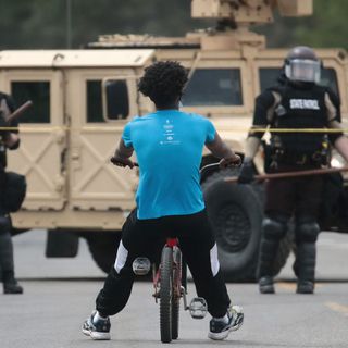 Why Protesters In Minneapolis Are Facing Militarized Law Enforcement