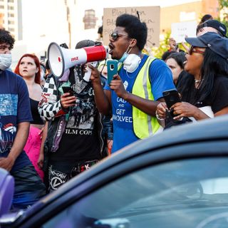 Detroit leaders say suburban troublemakers, not national groups, spoiled peaceful rally