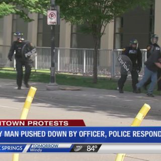 ABC4 News captures police officer armed in protest gear pushing down man with cane