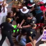 Officer seen pushing teen during protest has been accused of unnecessary force and racial profiling