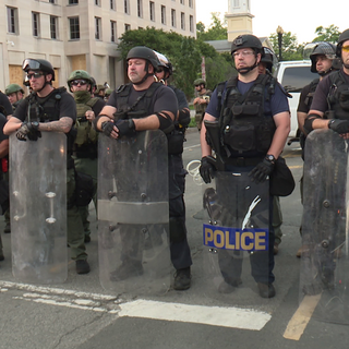 Unmarked, armed riot officers seen around D.C. won't say what agency they are from