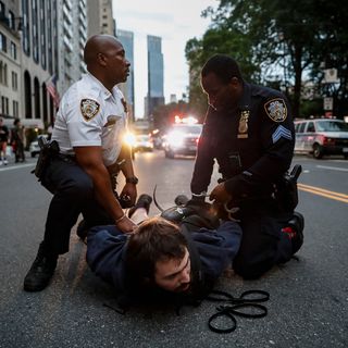 New York police have arrested at least 90 people tonight