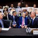 Families confront Boeing CEO Dennis Muilenburg on Capitol Hill with photos of 737 MAX crash victims