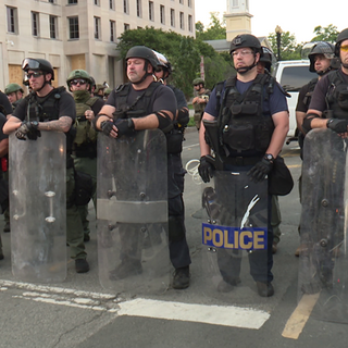 Unmarked, armed riot officers seen around D.C. won't say what agency they are from