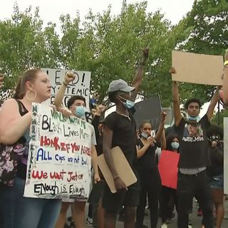 Taunton protest remains peaceful, officers kneel to end the night