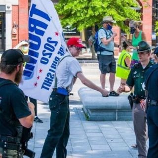 New Hampshire State Police issue statement on 'fist bump' photo with Trump supporter