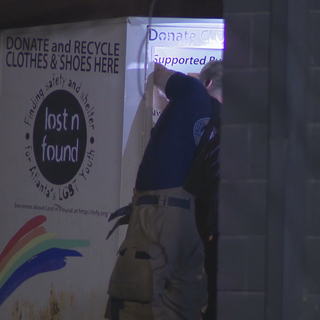 Police: Woman dies after getting trapped in donation box