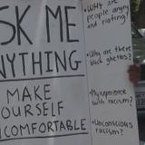 Dripping Springs man carries sign welcoming conversations about race