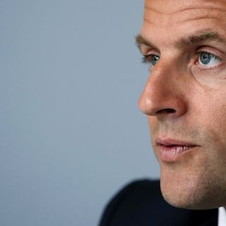 French leader rejects racism but colonial statues to remain