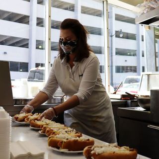 Whitmer slings coneys downtown Thursday