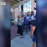 Shorewood woman seen spitting on protester in viral video wants to meet with him, apologize