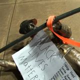 Demonstrators topple 2 statues from Confederate monument outside NC Capitol building