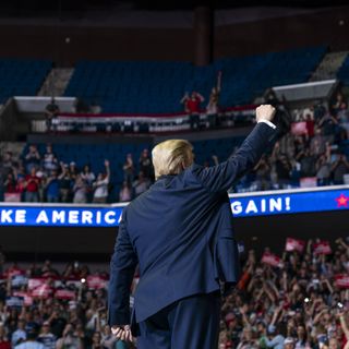 Trump comeback rally features empty seats, staff infections