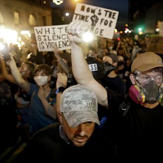 Trump supporters, protesters face off outside Oklahoma rally