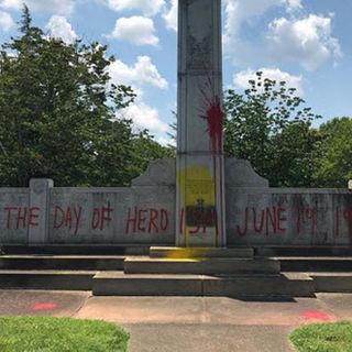 World War II monument defaced with paint at Charlotte cemetery