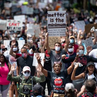 Activists halt street protests in South Carolina as some demonstrators become infected