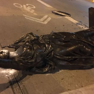 Protesters pull down Forward statue, Col. Hans Christian Heg statue outside State Capitol