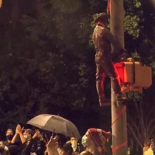 Protesters tear down parts of Confederate monument at State Capitol :: WRAL.com