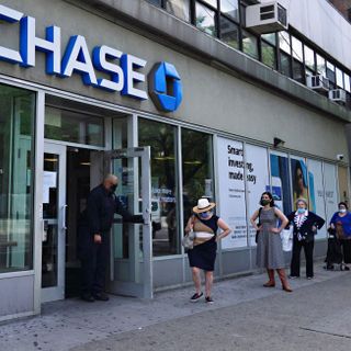 Bank stocks surge after regulators ease Volcker Rule, JPMorgan Chase climbs 2%