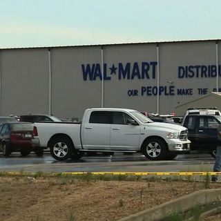 Gunman kills one employee at Walmart distribution center before police fatally shoot him