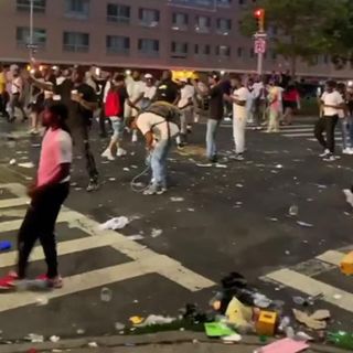 NYPD cars hit with glass bottles and other debris in Harlem after responding to report of gunfire detected | CNN