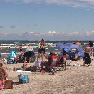 Popular Ontario beach partially closing after 'human behaviour at its worst' on Canada Day