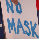 Shed the Mask, Don the Flag rally held by anti-mask demonstrators in downtown Austin