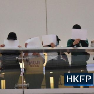 Security law: Hong Kong police arrest 8 at 'blank placard' silent protest - Hong Kong Free Press HKFP