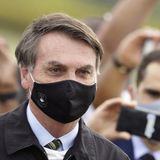 Brazil's president, infected with virus, touts malaria drug