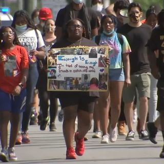 Young Chicagoans call for reallocation of police funds in 'Love March'